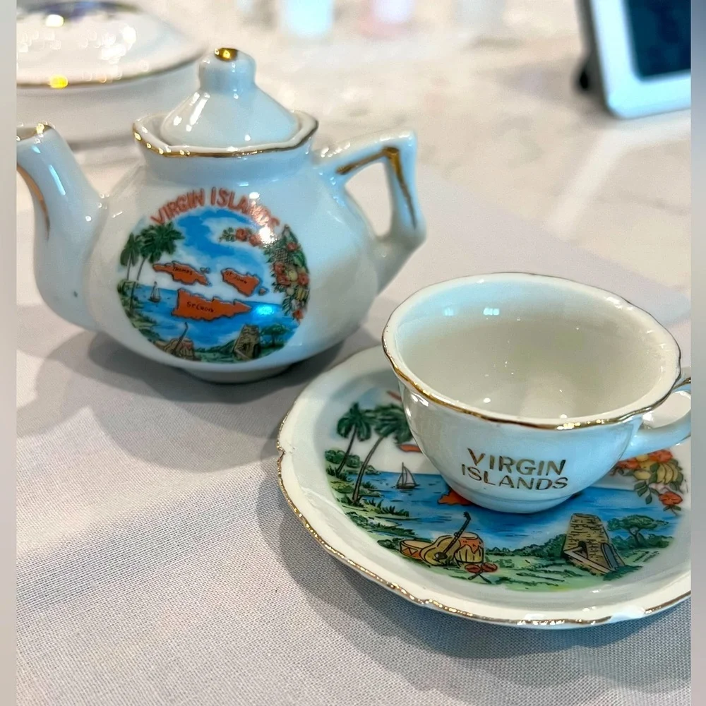 Miniature teapot, cup and saucer set